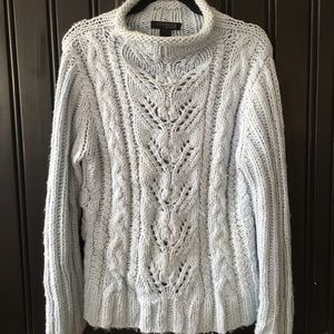 Woman’s light blue cable knit sweater, Medium
